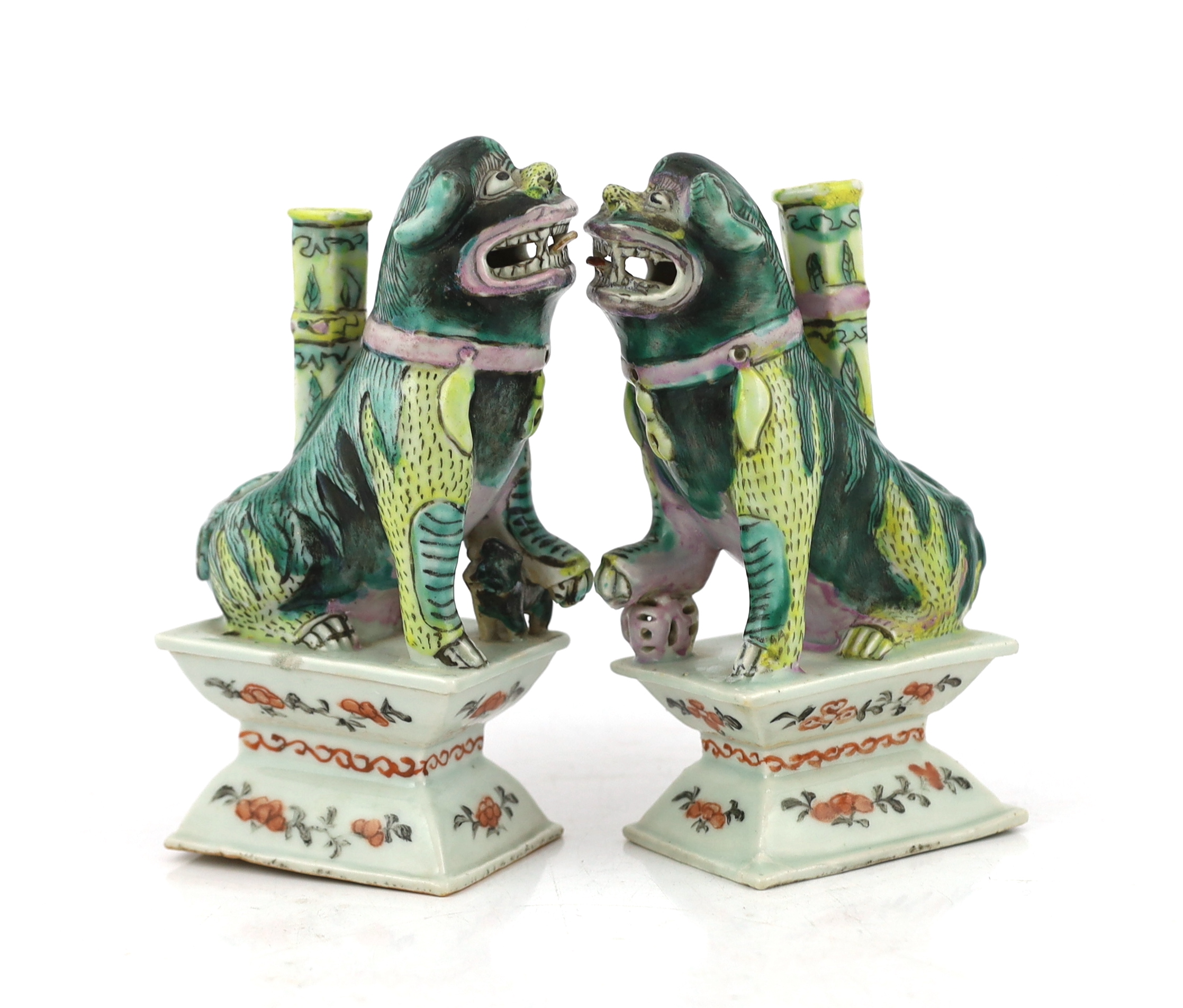 A pair of Chinese enamelled porcelain ‘Buddhist lion’ joss stick holders, early 19th century